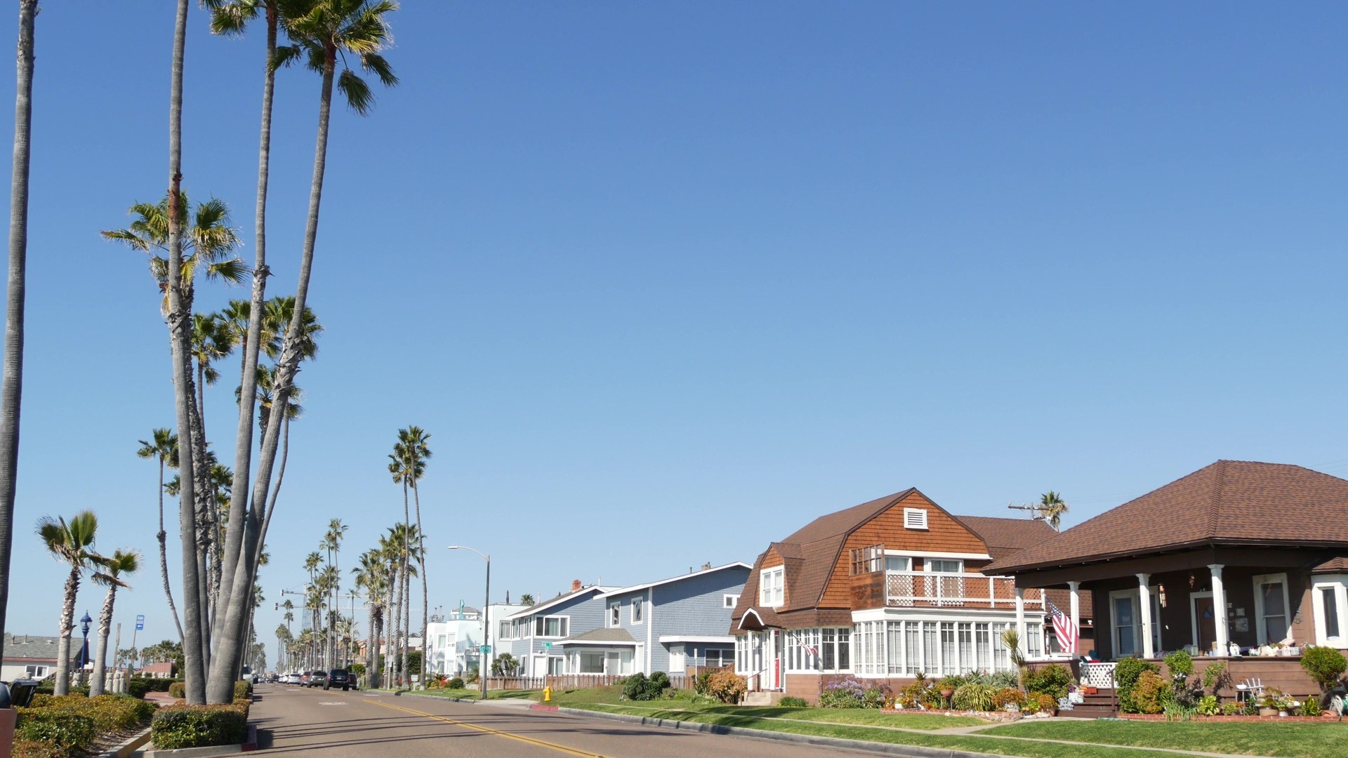 Houses on suburban street, California USA. Generic buildings, residential district near Los Angeles.